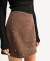 Elka Collective Avenue Mini Skirt in Mocha — texture does the talking here.