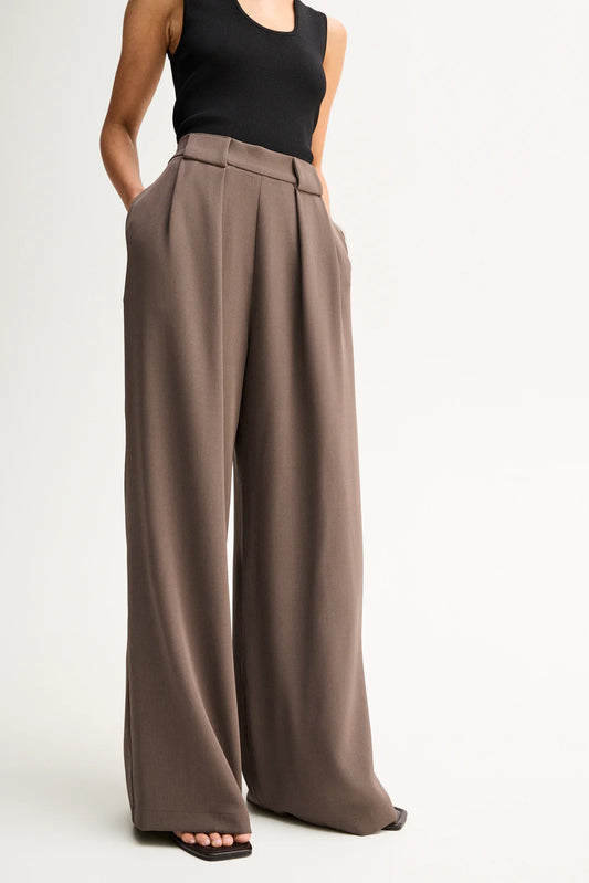 Elka Collective Fleur Pants in Taupe, waistband and wide-leg detail.
