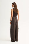 Elka Collective Lindsay Knit Top in Chocolate, back view showing the fitted sleeveless silhouette.