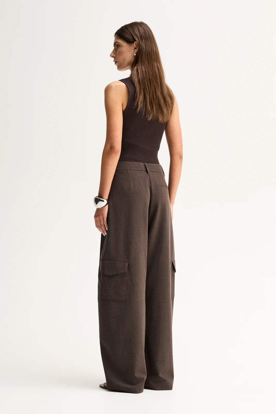 Elka Collective Lindsay Knit Top in Chocolate, back view showing the fitted sleeveless silhouette.