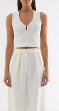 Elka Collective Lindsay Knit Top in White, front view on model.
