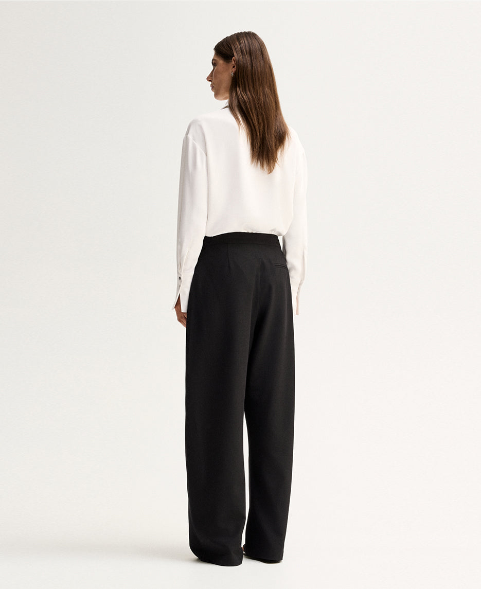 Elka Collective Millicent Shirt in Ivory — meet the shirt that trades basic for statement.