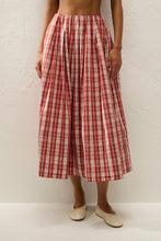 Faithfull The Brand Cales Skirt in Ines Check Terra Rosso, close-up front view on model