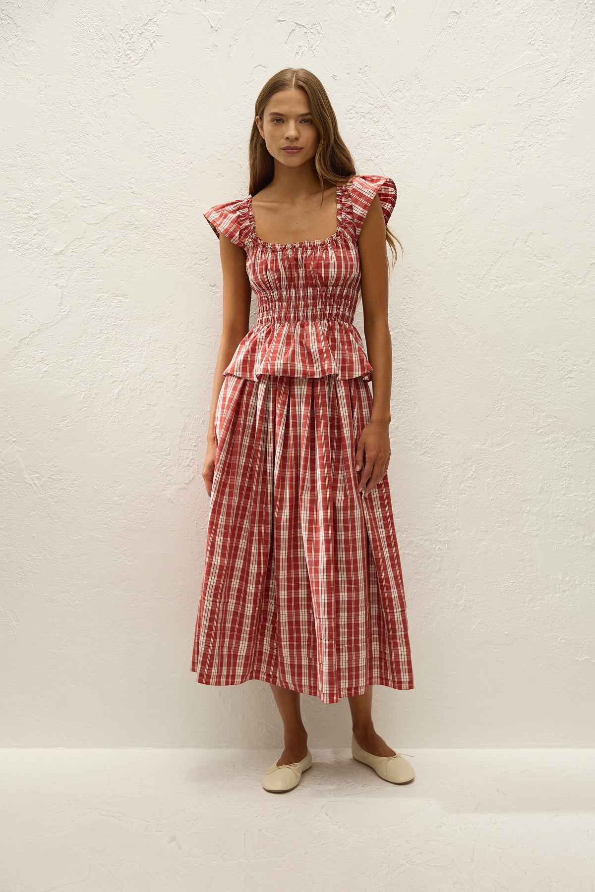 Faithfull The Brand Janne Top in Ines Check Terra Rosso, front styling view on model.