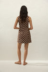 Faithfull The Brand Lydie Mini Dress Cioccolato Dot — embrace a playful, retro-inspired aesthetic with the Lydie Mini Dress by Faithfull The Brand.