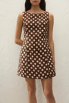 Faithfull The Brand Lydie Mini Dress Cioccolato Dot — embrace a playful, retro-inspired aesthetic with the Lydie Mini Dress by Faithfull The Brand.