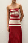A close-up front view shows the red and cream striped fitted bodice with a drawstring neckline.
