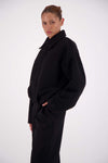 Jasmine Alexa Bailey Bomber Jacket in Black, cropped side view showing the relaxed silhouette.
