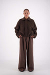 Jasmine Alexa Bailey Bomber Jacket in Brown, full-length front view on model.

