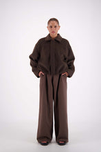 Jasmine Alexa Bailey Bomber Jacket in Brown, full-length front view on model.
