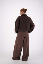 Jasmine Alexa Bailey Bomber Jacket in Brown, full-length back view on model.

