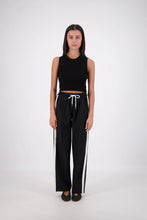 Jasmine Alexa Cassis Trouser in Black, full-length front view on model.
