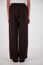 Jasmine Alexa Cassis Trouser in Brown, back view showing the elastic waistband and wide-leg fit.