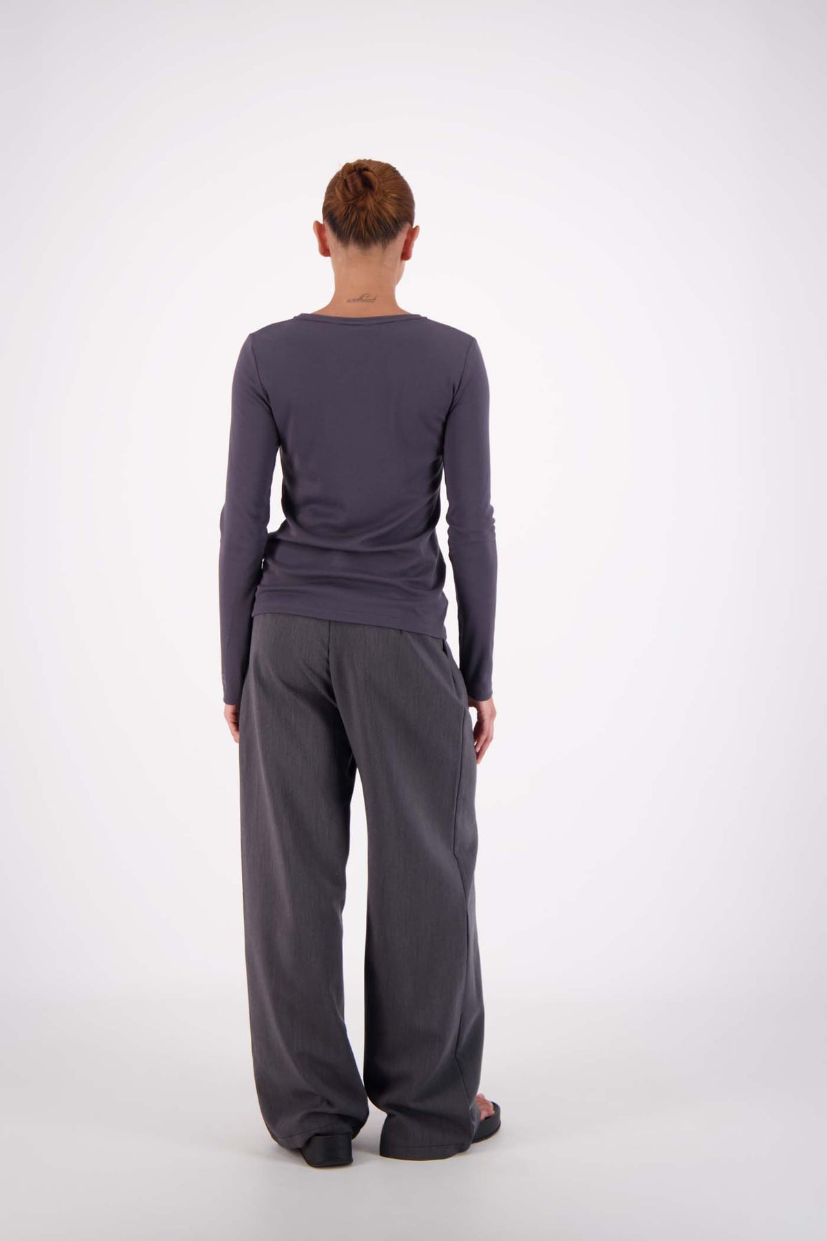 Jasmine Alexa Gigi Trouser in Steel Grey — effortlessly polished, the Gigi Trouser from Jasmine Alexa blends relaxed tailoring with everyday wearability.