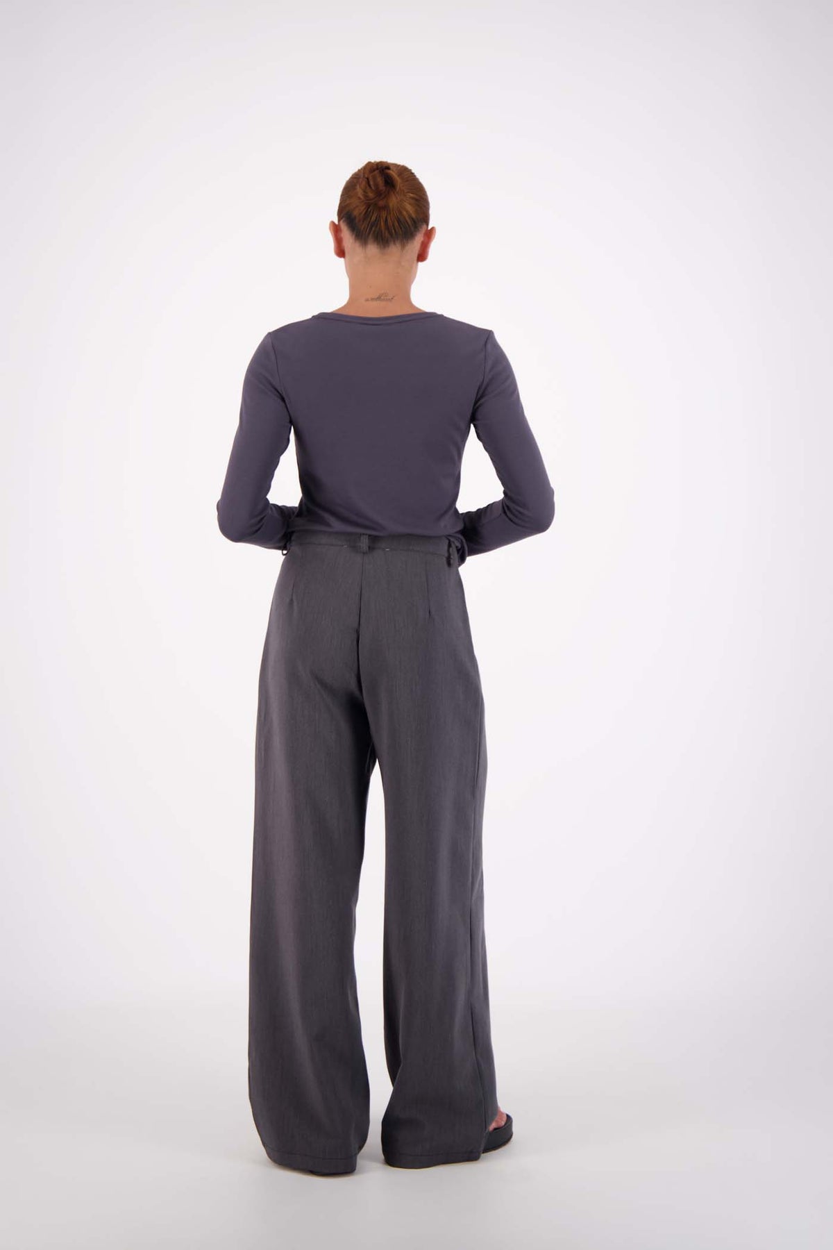 Jasmine Alexa Gigi Trouser in Steel Grey — effortlessly polished, the Gigi Trouser from Jasmine Alexa blends relaxed tailoring with everyday wearability.