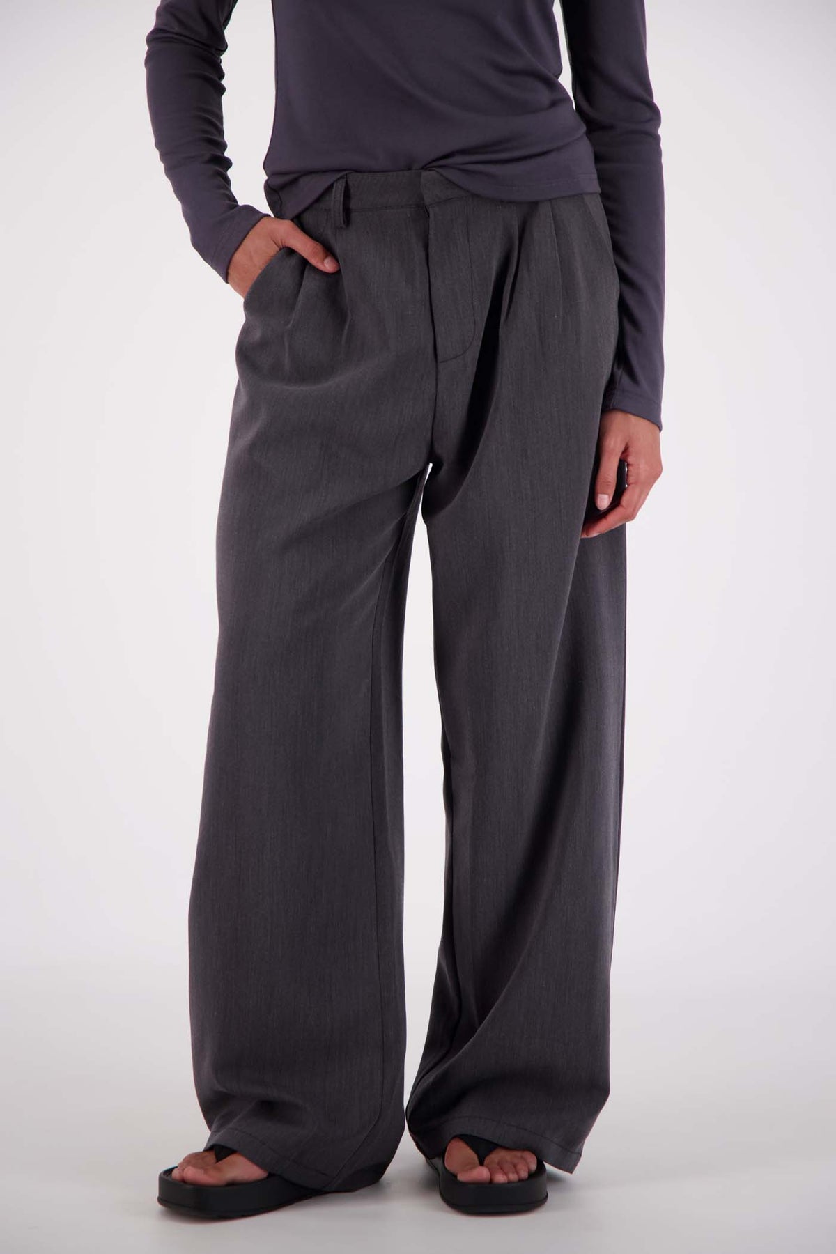 Jasmine Alexa Gigi Trouser in Steel Grey — effortlessly polished, the Gigi Trouser from Jasmine Alexa blends relaxed tailoring with everyday wearability.