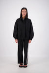 Jasmine Alexa Ischia Bomber Jacket in Black, full-length front view on model.
