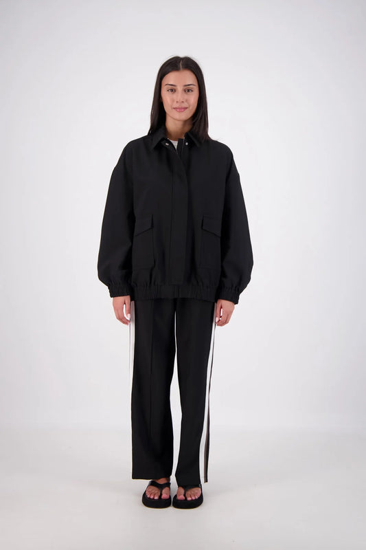 Jasmine Alexa Ischia Bomber Jacket in Black, full-length front view on model.

