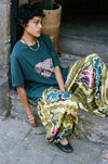 Kinga Csilla Avviso Lotus Tee — your new go-to graphic tee with a beautifully bohemian twist.