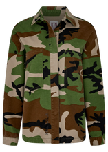 Camouflage jacket with visible branding on a white background