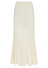 Cream lace maxi skirt shown on its own, showing the fitted waistband, long flowing silhouette, intricate lace texture and softly flared hem.