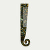 Kitty Paloma Swirl Comb in Tortiseshell — the Swirl Comb is a sculptural show-stopper with architectural lines that flow into a sophisticated and functional hair comb.