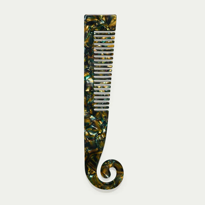 Kitty Paloma Swirl Comb in Tortiseshell — the Swirl Comb is a sculptural show-stopper with architectural lines that flow into a sophisticated and functional hair comb.