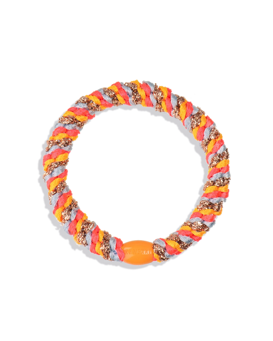 Multicoloured woven hair tie in rose, baby blue, orange and glitter tones shown against a plain background.