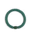 Teal-green glitter woven hair tie shown individually against a clean dark background, highlighting the circular shape, metallic texture and smooth branded bead.