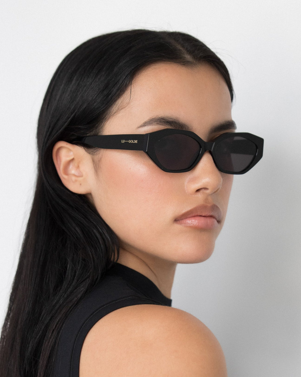 Lu Goldie - Eliana Sunglasses in Black — these honeys are the sunnies equivalent of spending an hour and a half doing no-makeup-makeup and woke-up-like-this hair.
