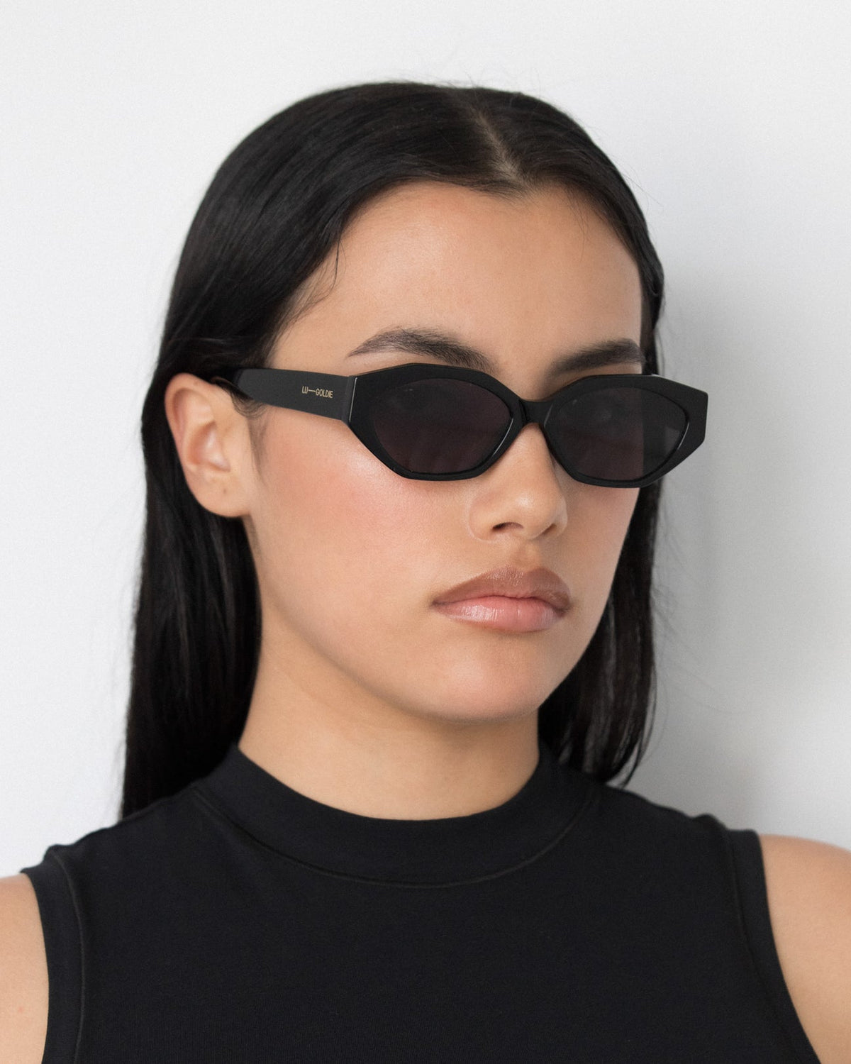 Lu Goldie - Eliana Sunglasses in Black — these honeys are the sunnies equivalent of spending an hour and a half doing no-makeup-makeup and woke-up-like-this hair.