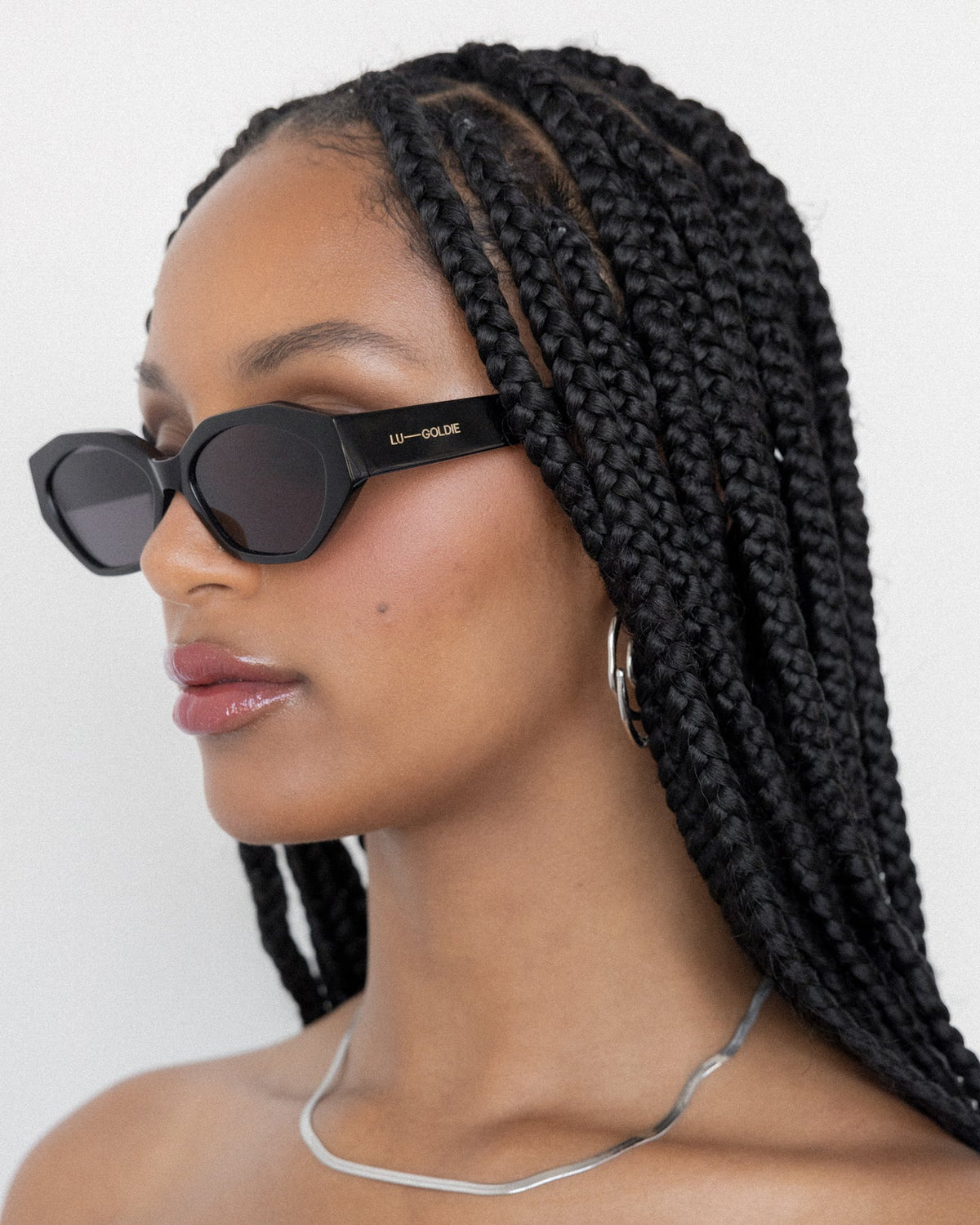 Lu Goldie - Eliana Sunglasses in Black — these honeys are the sunnies equivalent of spending an hour and a half doing no-makeup-makeup and woke-up-like-this hair.