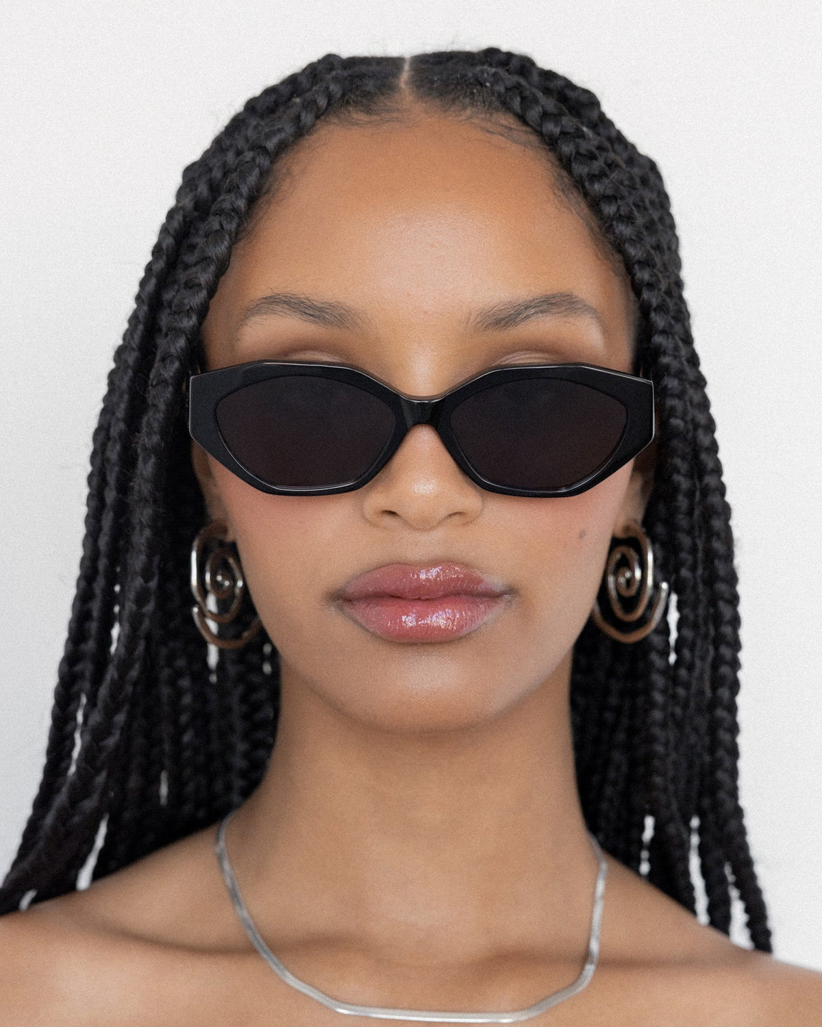 Lu Goldie - Eliana Sunglasses in Black — these honeys are the sunnies equivalent of spending an hour and a half doing no-makeup-makeup and woke-up-like-this hair.