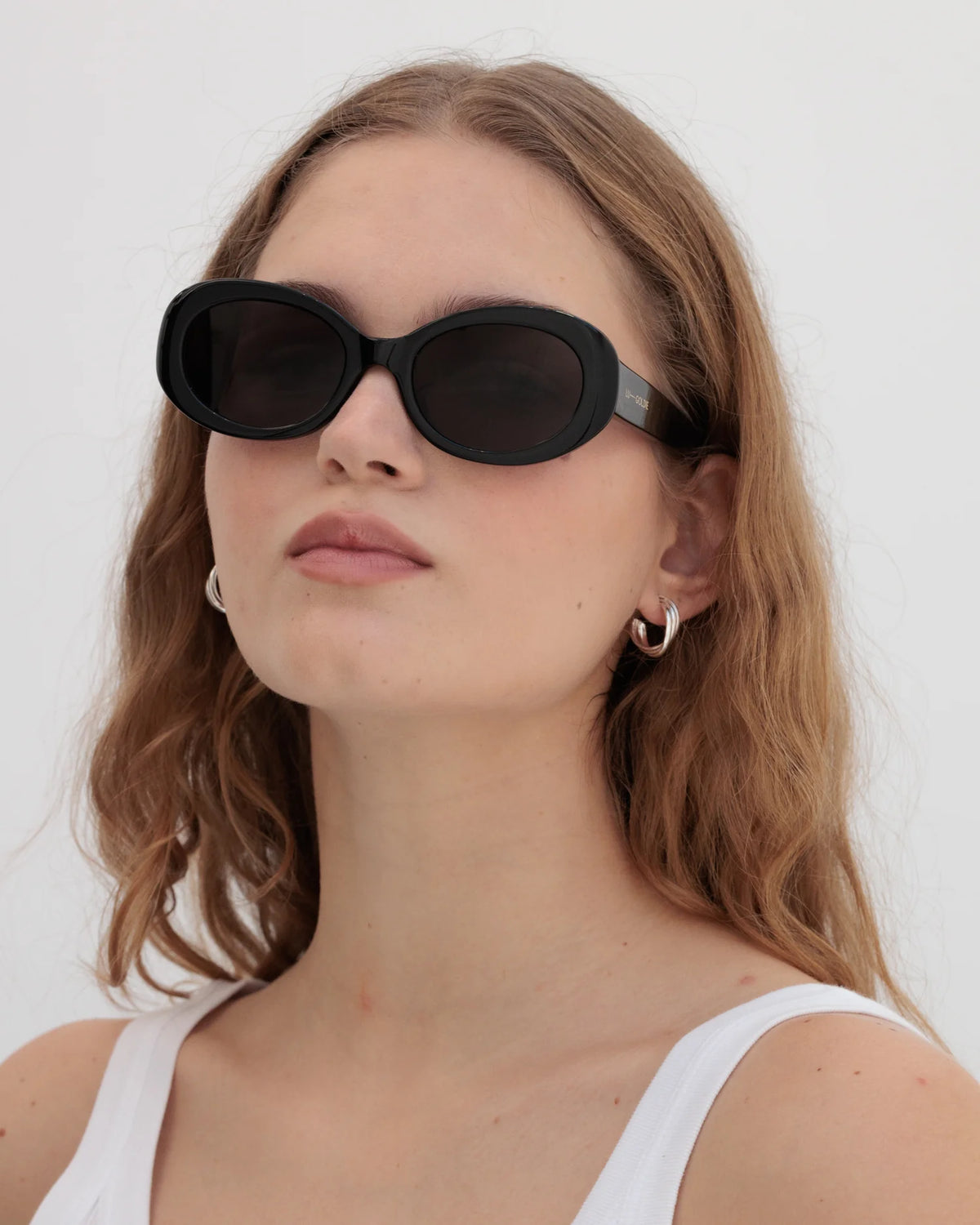 Lu Goldie Valentina in Black — they’re giving old money, mob wife, 60s superstar paparazzi’d descending from her private jet.