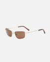 Lu Goldie Yuki Sunglasses in Coffee — she can pull off any look— hyper feminine, iconic 90s or futuristic cyber punk.