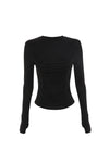 The black long-sleeve top is displayed from the front, showing its fitted shape and ruched centre panel.
