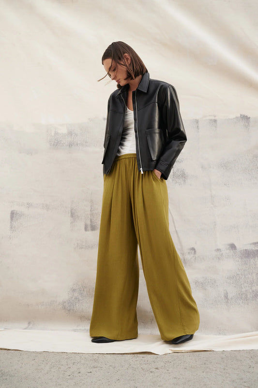 Nude Lucy Anthea Pant in Avocado — the Nude Lucy Anthea Pant in avocado is made from a Lyocell blend fabrication with a crinkle texture and soft hand feel.
