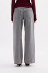 A back view shows the Steel boyfriend jeans with rear patch pockets and a relaxed wide-leg fit.
