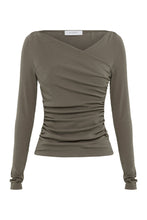 Truffle long sleeve top displayed alone showing the draped front, fitted waist and long sleeves.