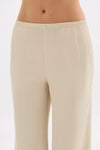 Close-up front view showing the elasticated waistband and textured crinkle fabrication.