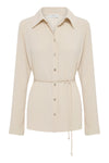 Product-only front view of the cream long sleeve shirt with traditional collar, shell buttons and waist tie.