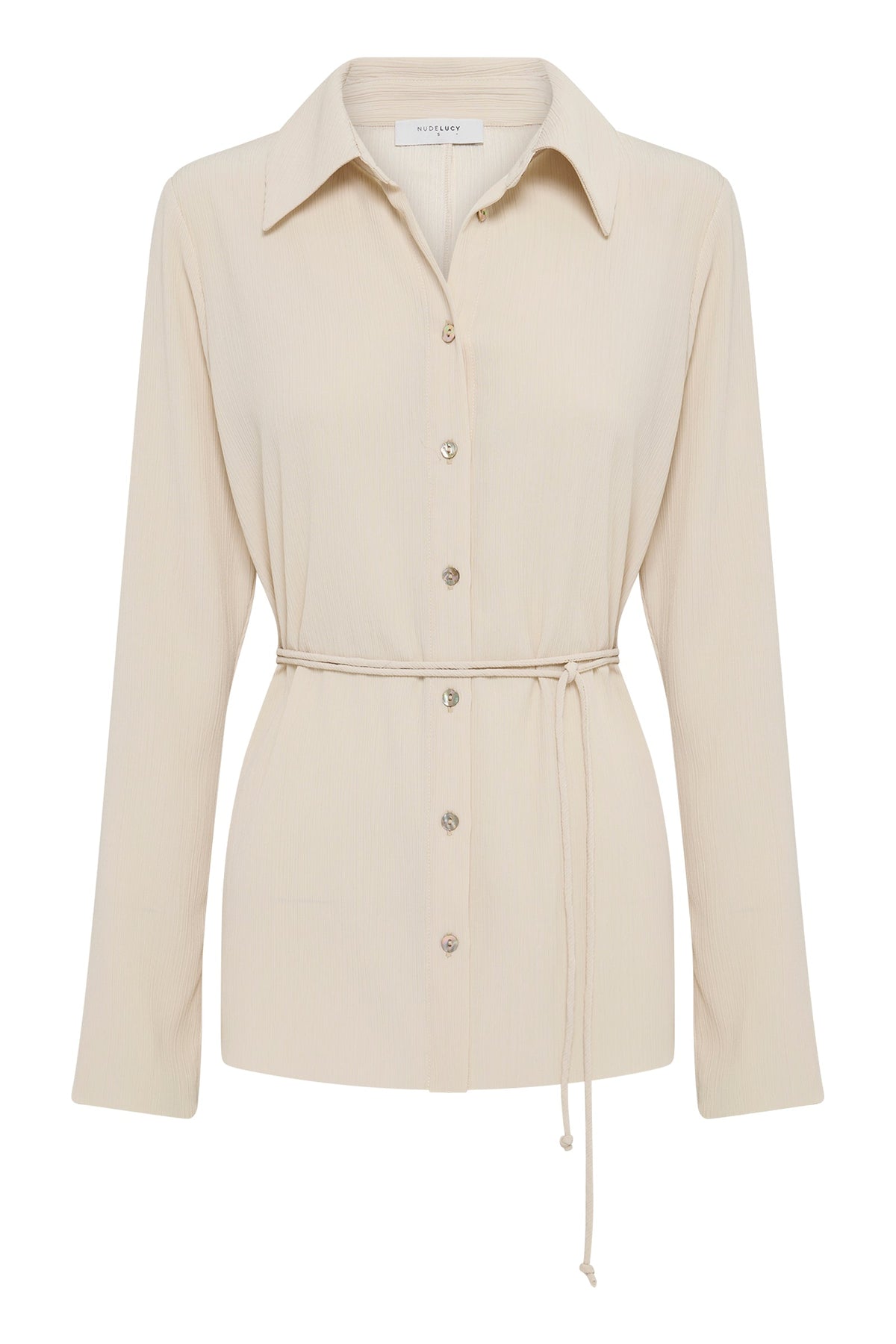 Product-only front view of the cream long sleeve shirt with traditional collar, shell buttons and waist tie.