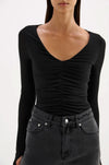 Nude Lucy Gigi Mesh Top in Black — the Gigi Mesh Top by Nude Lucy in Black is a sheer, lightweight layer designed to contour the body with a soft stretch finish.