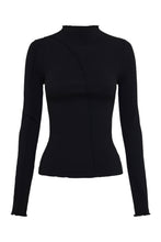 Black long sleeve top displayed alone showing the raised neckline, fitted shape and subtle seam detailing.