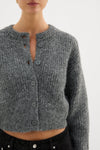Nude Lucy Nixon Cropped Cardigan in Charcoal — the Nixon Cropped Cardigan by Nude Lucy is crafted from a soft midweight knit with a subtle fluffy texture.