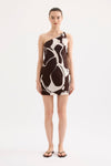 A model wears the Nude Lucy Ombra Mini Dress in Ombra Print in a full-length front studio view.

