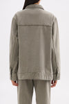 Back view showing the relaxed boxy shape, shoulder seam detailing and straight hem.