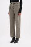Three-quarter view showing the relaxed straight-leg shape and stone-washed grey denim finish.