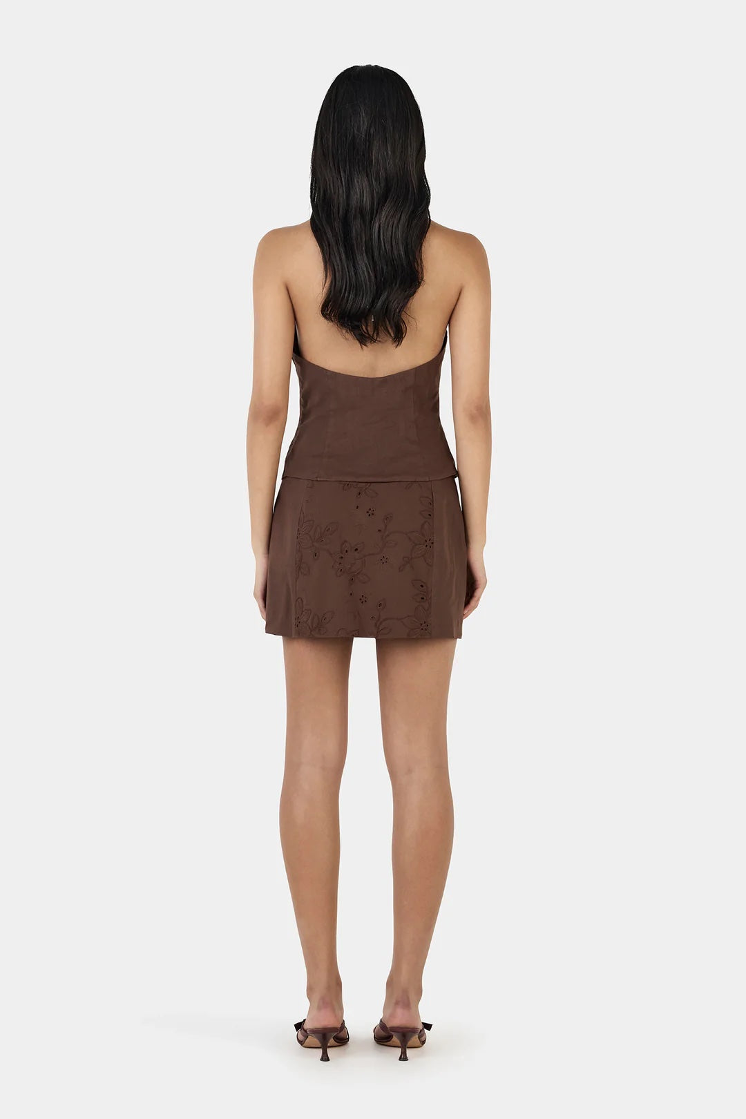 Ownley Anousha Halter Top in Chocolate Anglaise — the Anousha Top is a halter top crafted from a cotton floral broderie anglaise fabrication and a features a side front split detail.