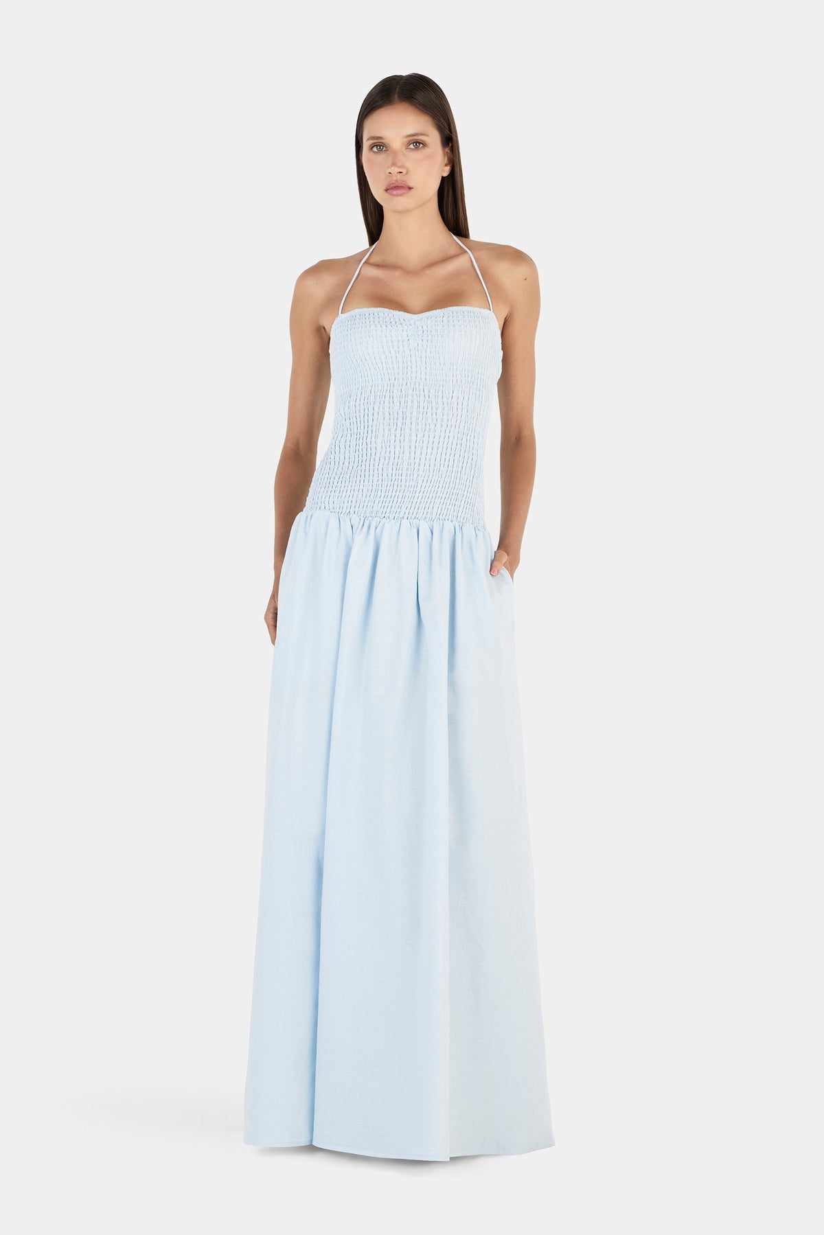 A full-length front view of the cornflower blue maxi dress with a fitted bodice and flowing skirt.